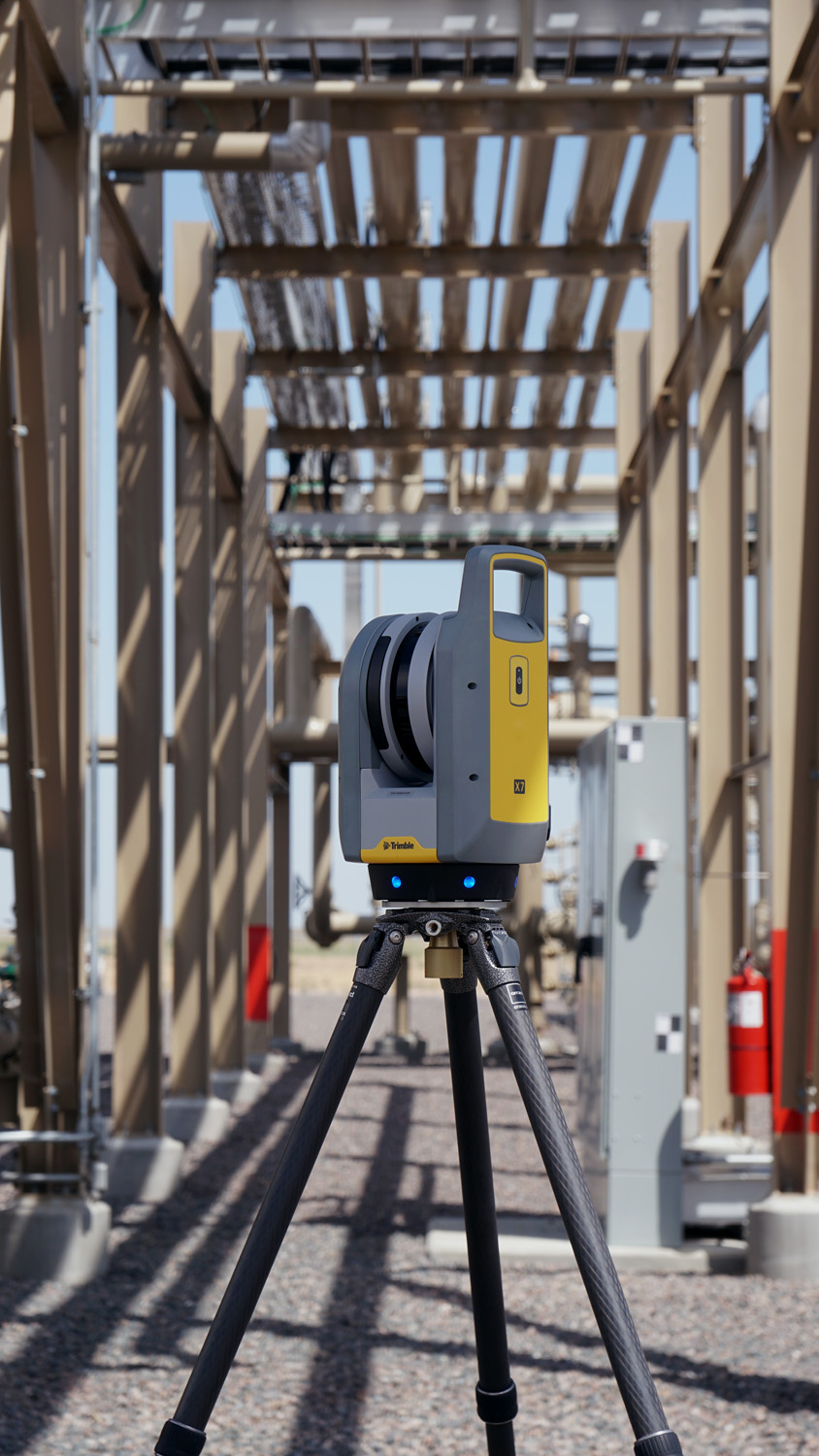 Trimble LiDAR scanner capturing existing building conditions before steel detailing begins.